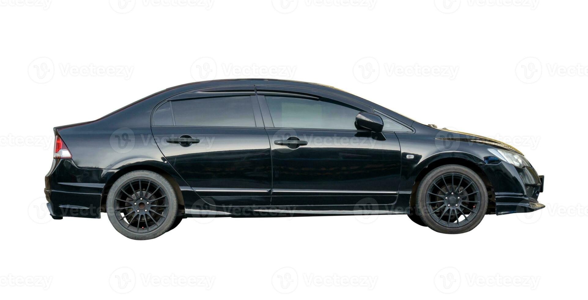 Luxurious dark gray or black sedan sports car isolated on white background with clipping path photo