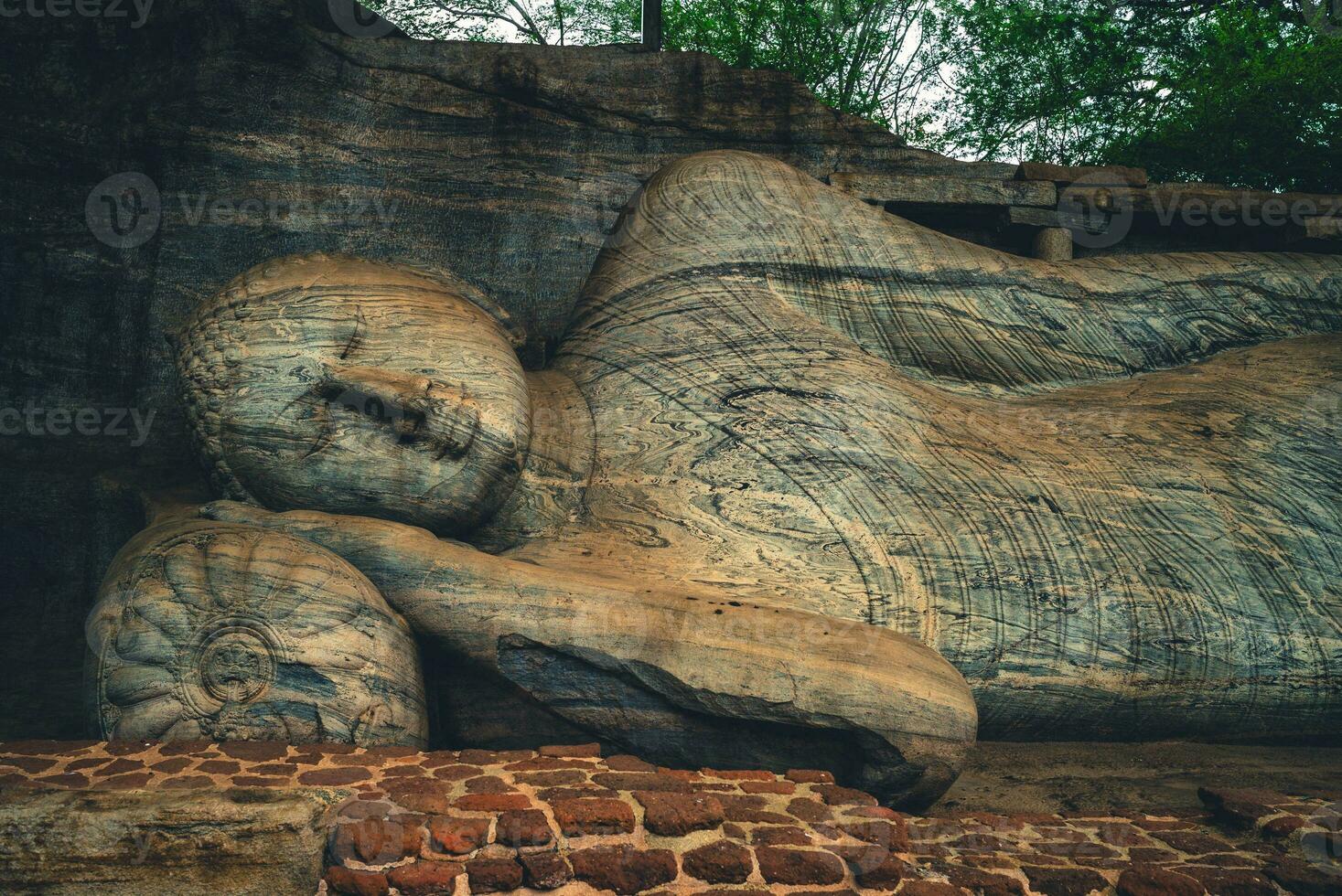 Reclining Buddha statue at Gal Vihara, the Rock Temple, in Polonnaruwa, sri lanka photo