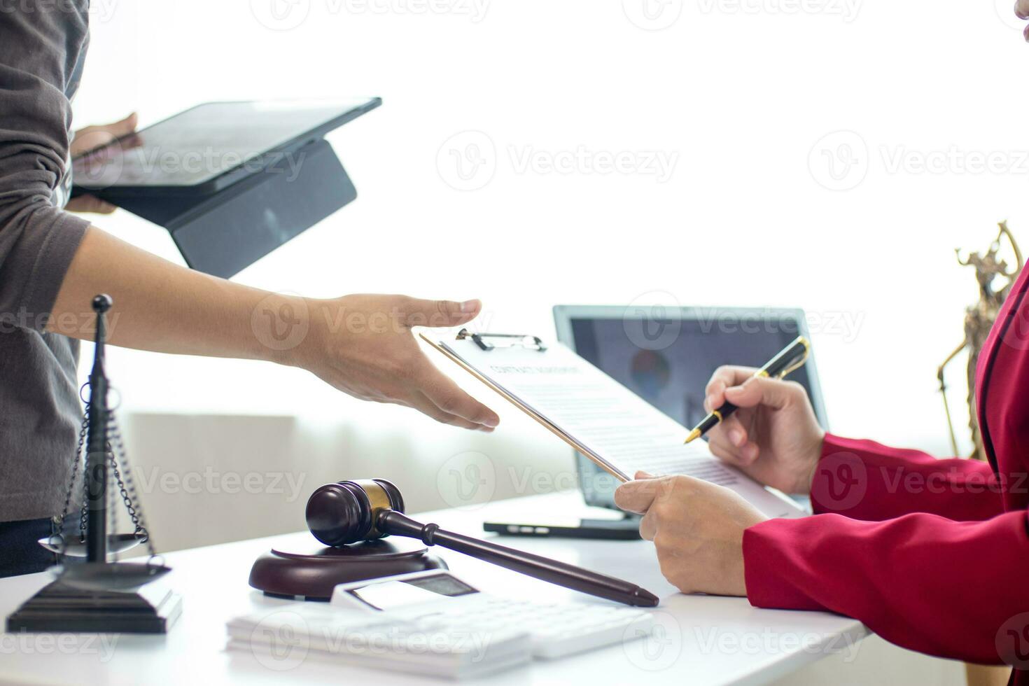 judge's gavel in law office is placed on table to symbolize judge deciding lawsuit. gavel wood on wooden table of lawyers in legal advice office as symbol of fair judgment in cases. photo