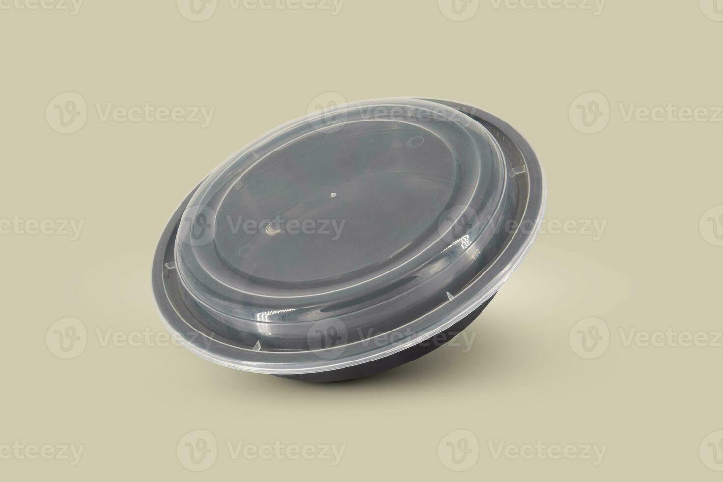 Black plastic food containers with transparent lid and white cardboard label photo