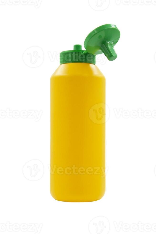 yellow squeeze plastic bottle for mustard isolated on white background photo