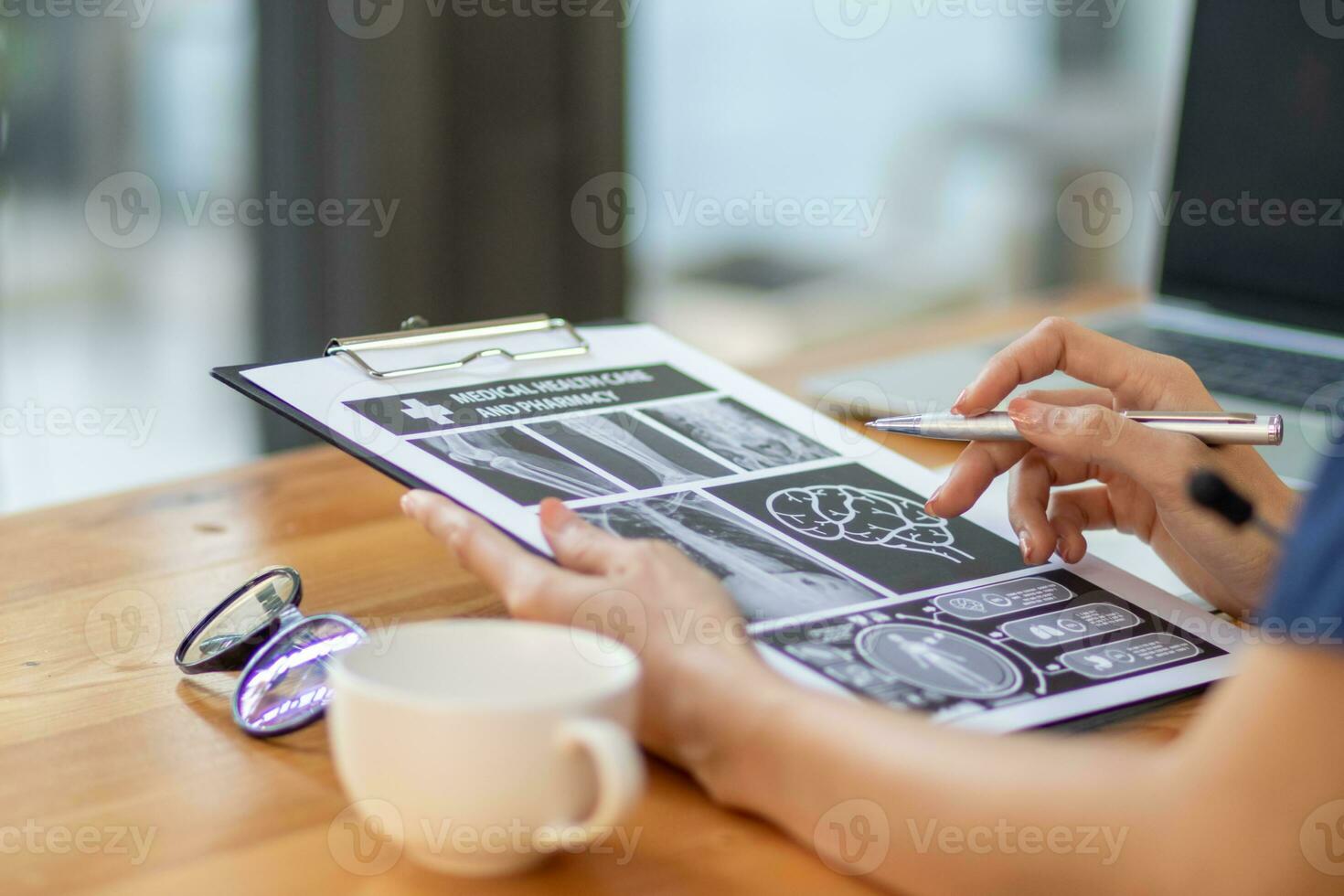 female doctor is reviewing documents to review and diagnose illness and female doctor has determined guidelines for initial treatment when the patient symptoms become more severe. Copy Space for text photo