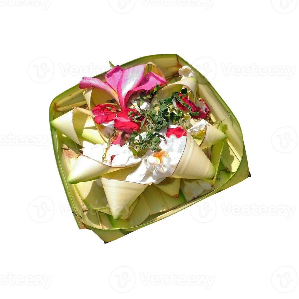 Canang sari Balinese Offerings in white background photo