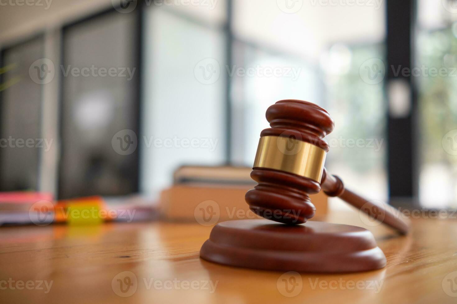 wooden judge gavel on table as symbol of justice for use in legal cases judicial system and civil rights and social justice concept with judge. concept of legislation to judge lawsuits with justice. photo