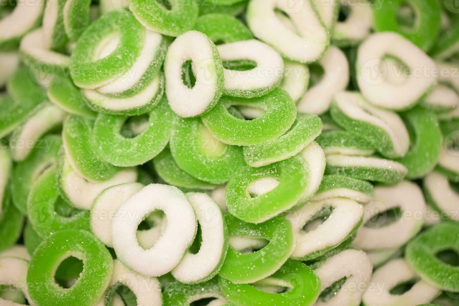 Sweets background. Bright gummy candies close-up. Close-up of colorful jujube background pattern photo