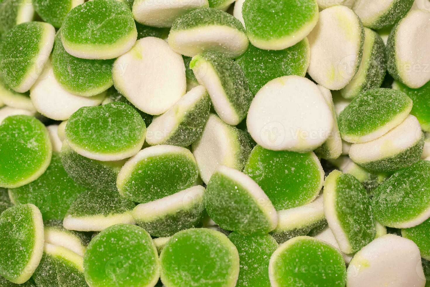 Sweets background. Bright gummy candies close-up. Close-up of colorful jujube background pattern photo