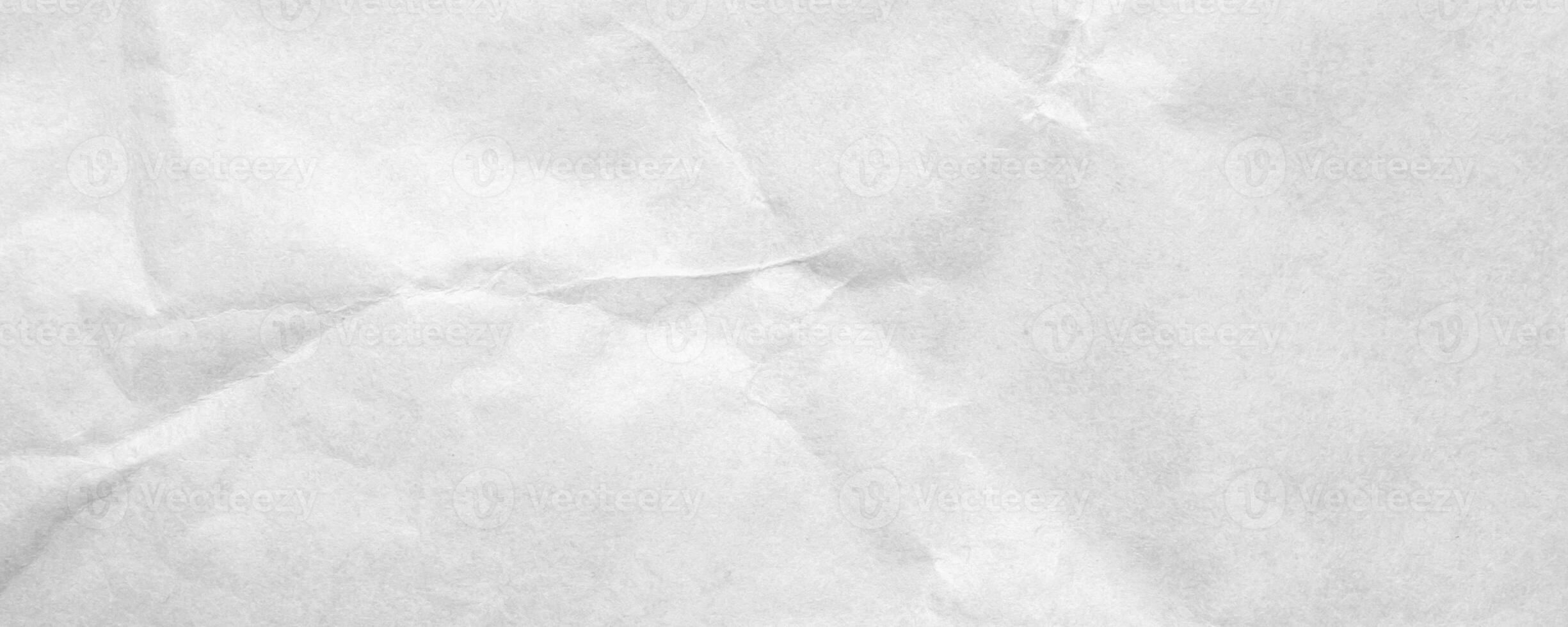 Abstract white crumpled and creased recycle craft paper texture background photo