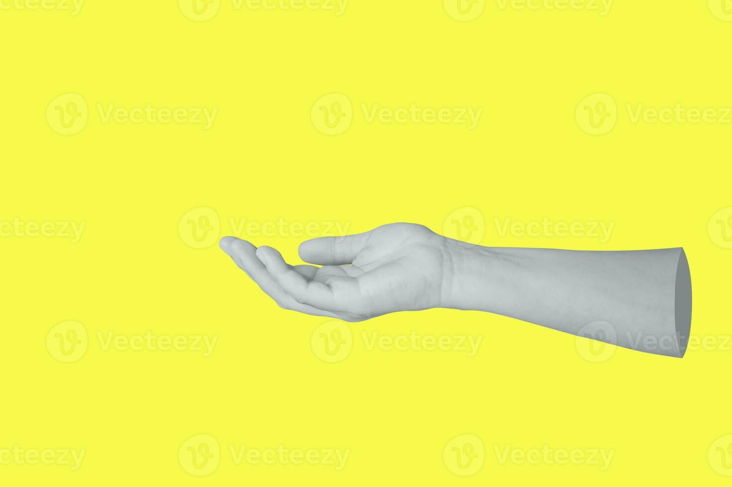 Woman hand gesture holding something isolated on yellow background photo