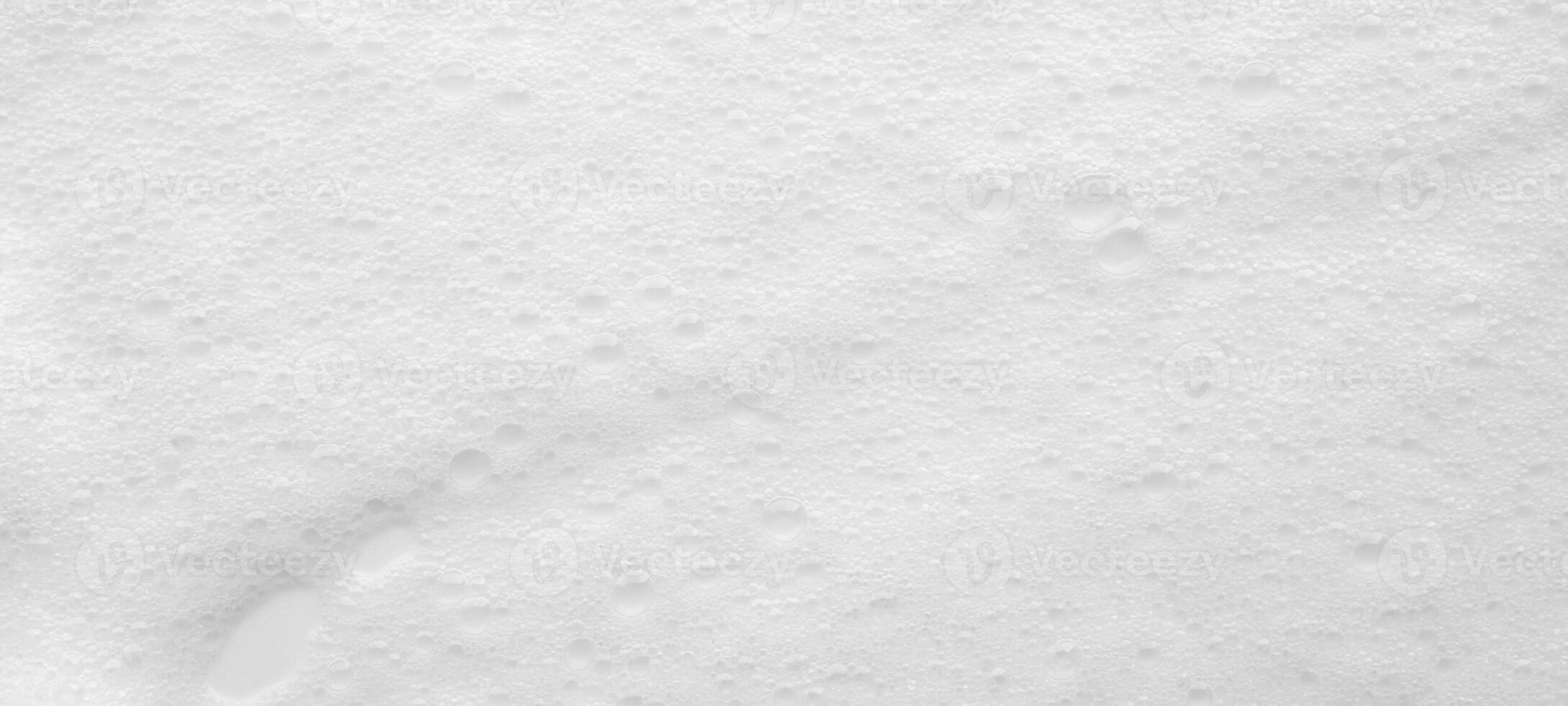Abstract white soap foam bubbles texture background photo
