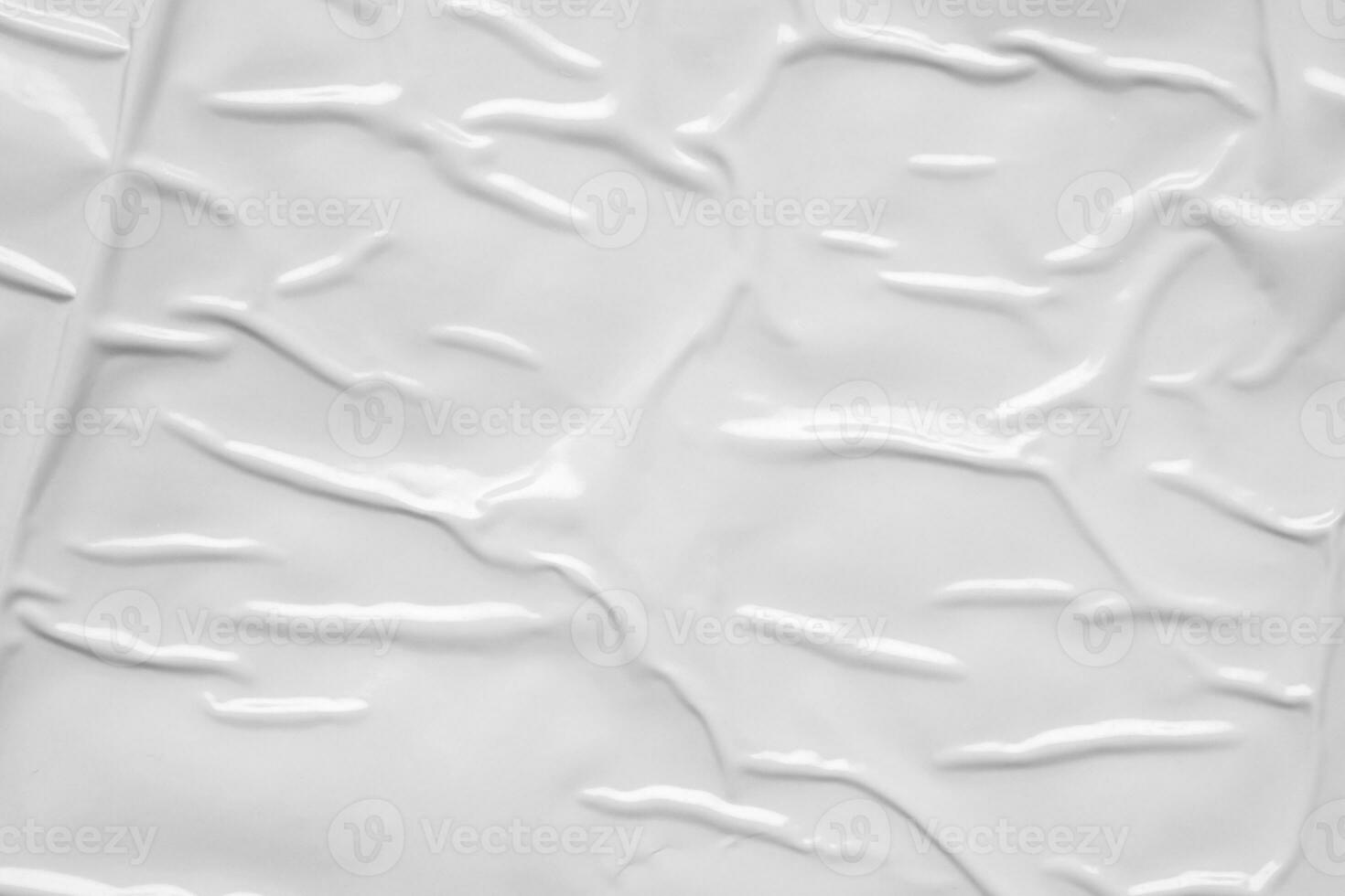 white crumpled and creased plastic bag texture background photo