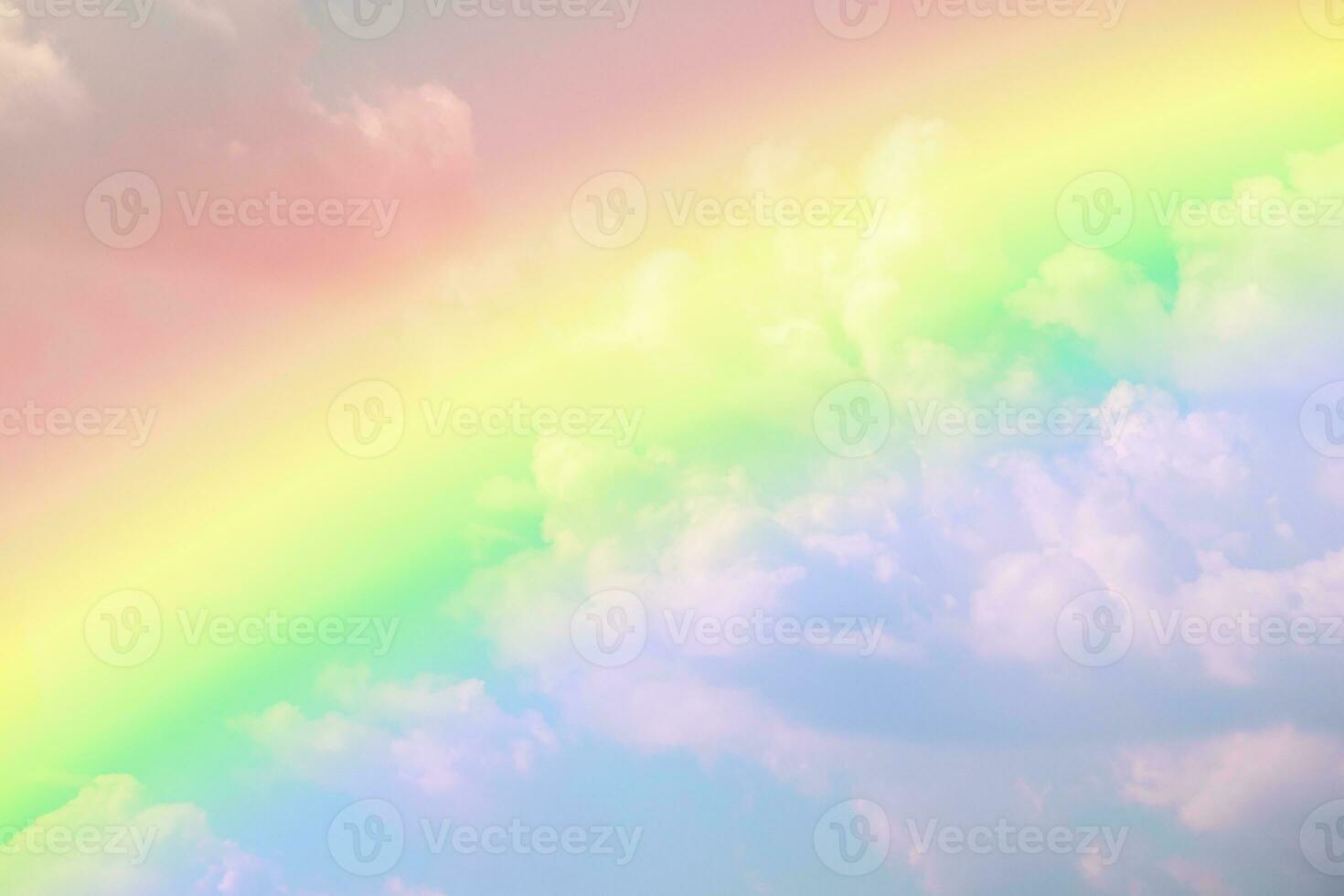 Beautiful rainbow with clouds and blue sky photo