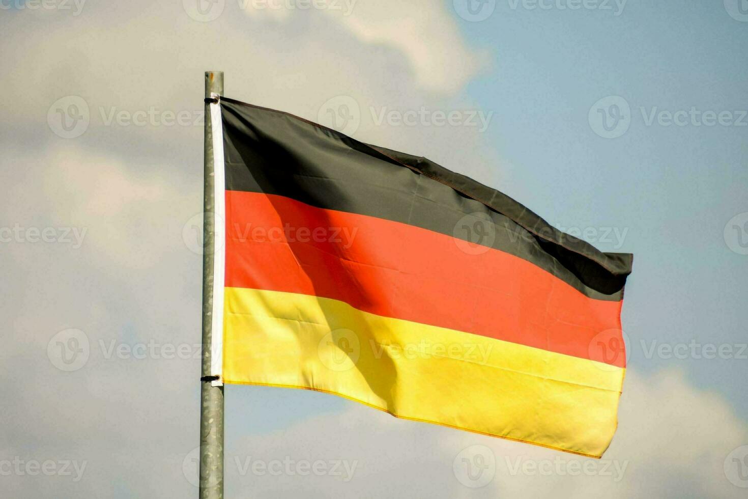 the german flag is flying high in the sky photo