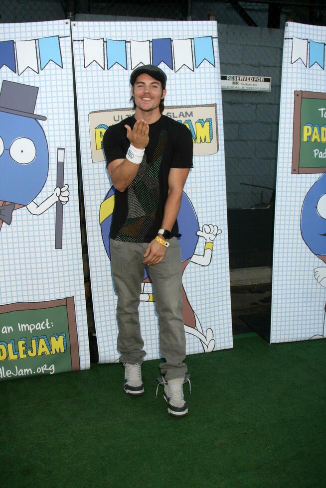 LOS ANGELES, SEP 26 - Josh Henderson arrives at the Ultimate Slam Paddle Jam 2010 at Music Box Theater on September 26, 2010 in Los Angeles, CA photo