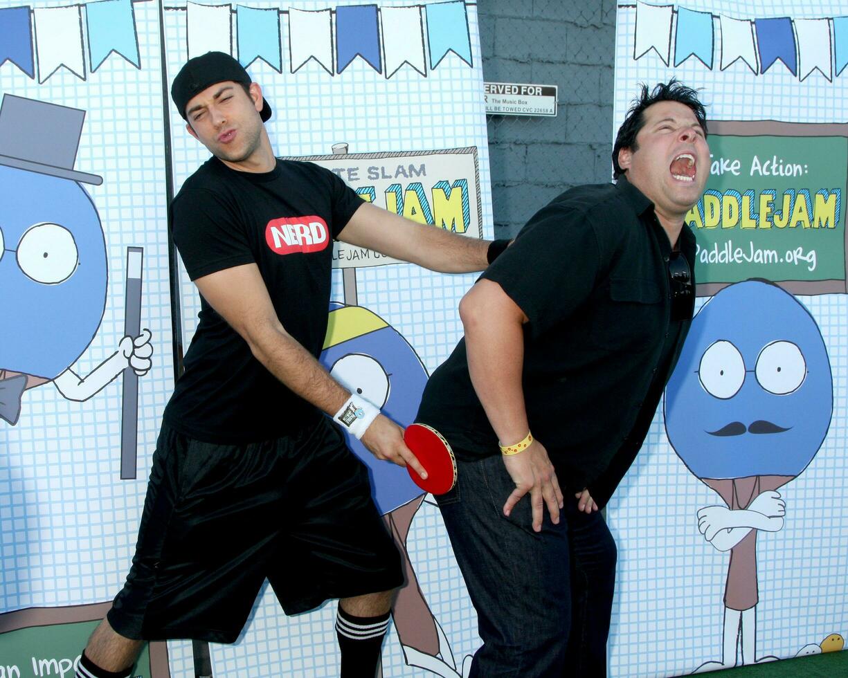 LOS ANGELES, SEP 26 - Zachary Levi and Greg Grunberg arrives at the Ultimate Slam Paddle Jam 2010 at Music Box Theater on September 26, 2010 in Los Angeles, CA photo