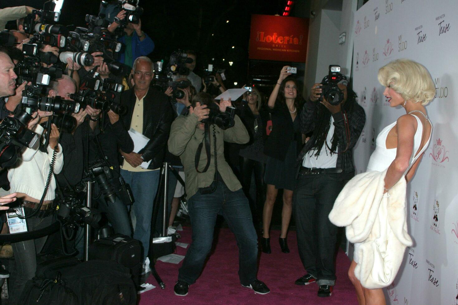 LOS ANGELES  AUG 10 Paris Hilton arrives at the Paris Hiltons Tease Fragrance Launch at My House on August 10 2010 in Hollywood CA photo