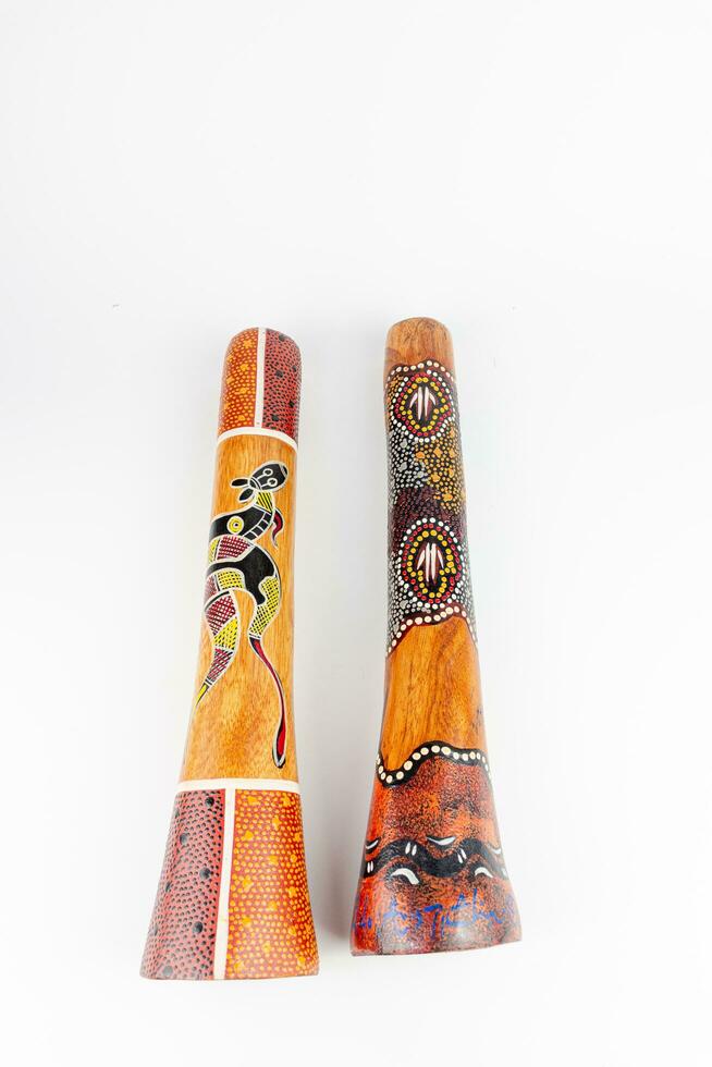 Aboriginal wooden musical instrument named Didgeridoo, Didgeridoo on white background. photo