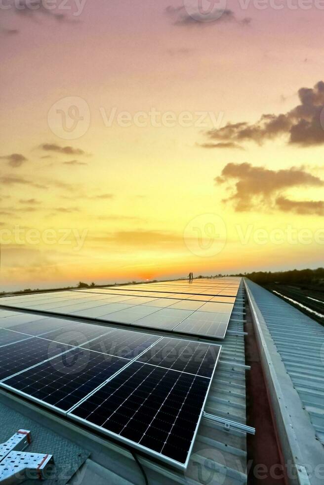 Photovoltaic panel, new technology to store and use the power from the nature with human life, sustainable energy and environmental friend concept. photo