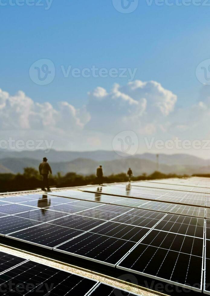 Photovoltaic panel, new technology to store and use the power from the nature with human life, sustainable energy and environmental friend concept. photo