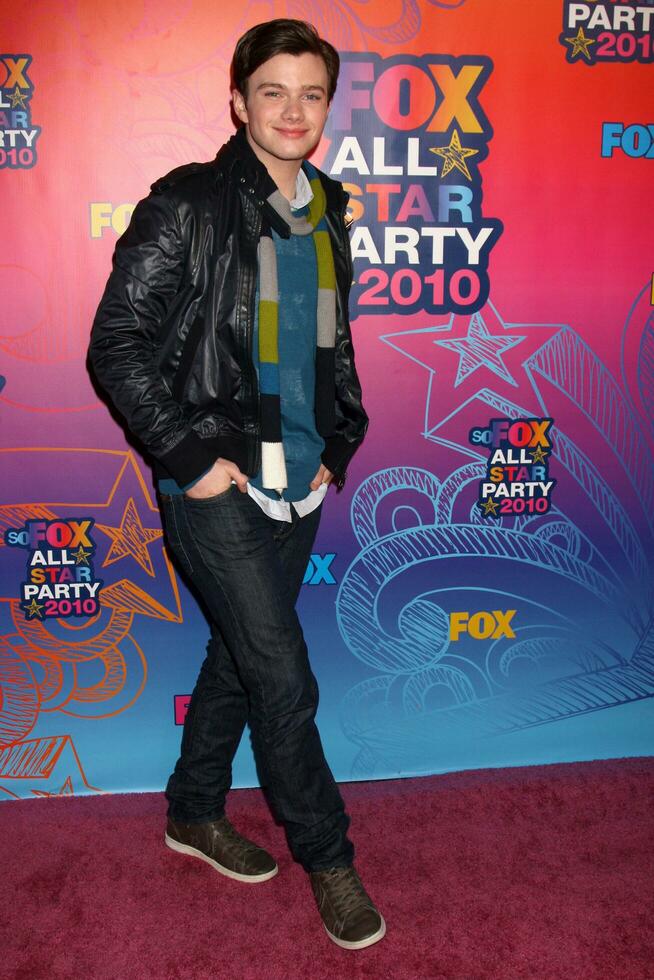 LOS ANGELES  AUGUST 2 Chris Colfer arrives at the 2010 FOX Summer Press Tour Party at Pacific Park on the Santa Monica Pier on August 2 2010 in Santa Monica CA photo