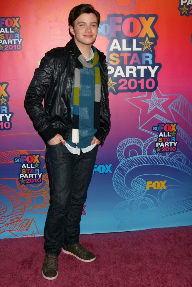 LOS ANGELES  AUGUST 2 Chris Colfer arrives at the 2010 FOX Summer Press Tour Party at Pacific Park on the Santa Monica Pier on August 2 2010 in Santa Monica CA photo