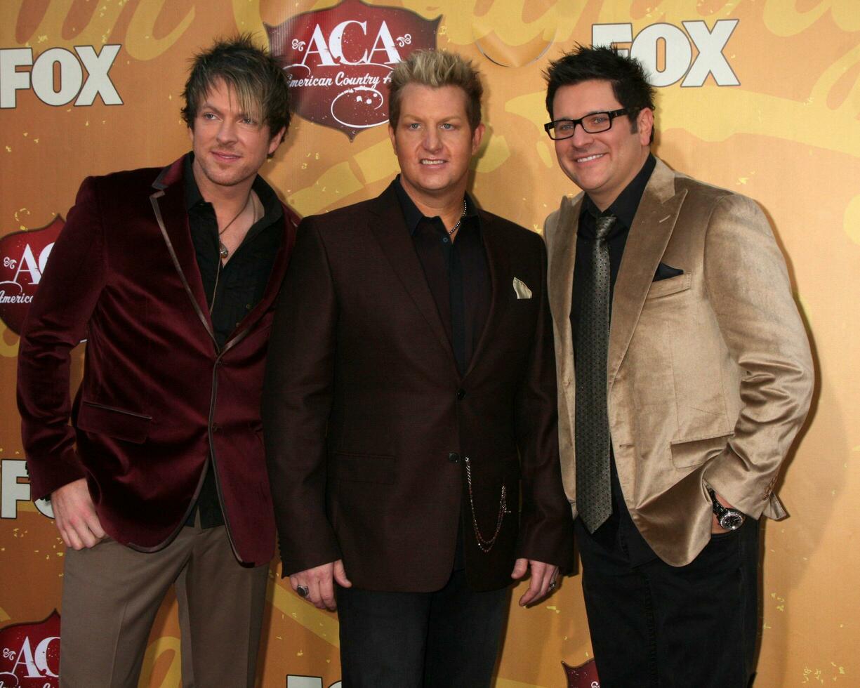 LOS ANGELES  DEC 6  Rascal Flatts Joe Don Rooney Gary LeVox Jay DeMarcus arrives at the 2010 American Country Awards at MGM Grand Garden Arena on December 6 2010 in Las Vegas NV photo