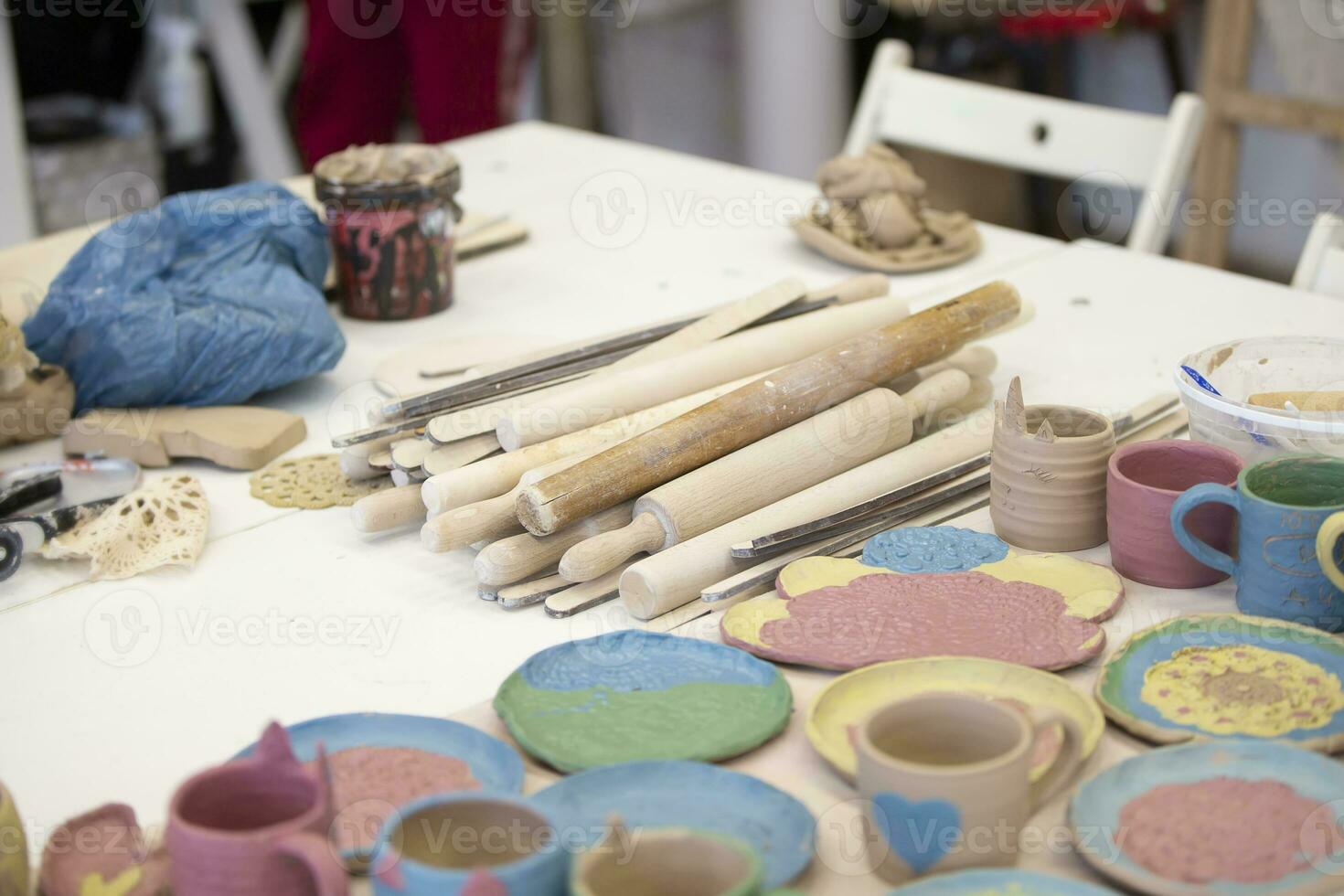 Clay products in the workshop on the table. Clay modeling master class. photo