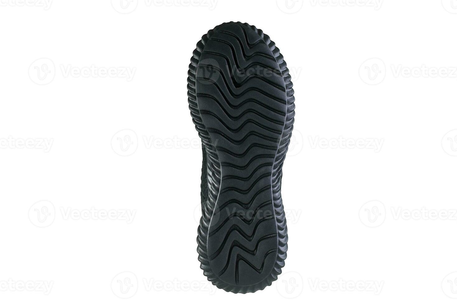 Black sole sneakers on a white background. photo