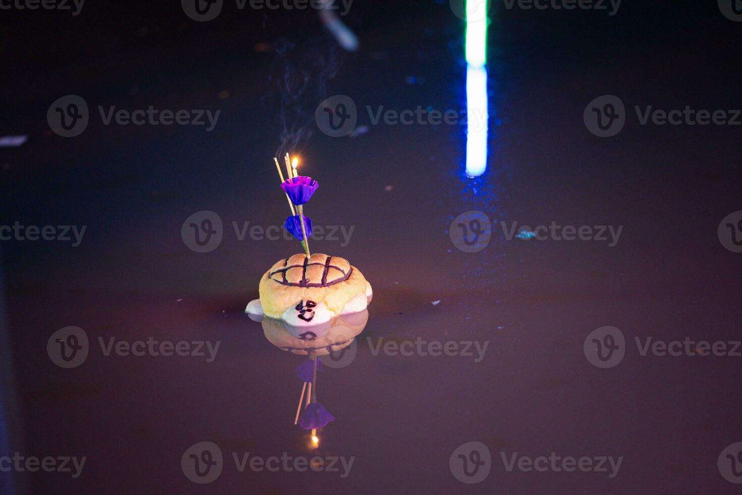 Krathong made from bread on the river at Loy Krathong festival. photo