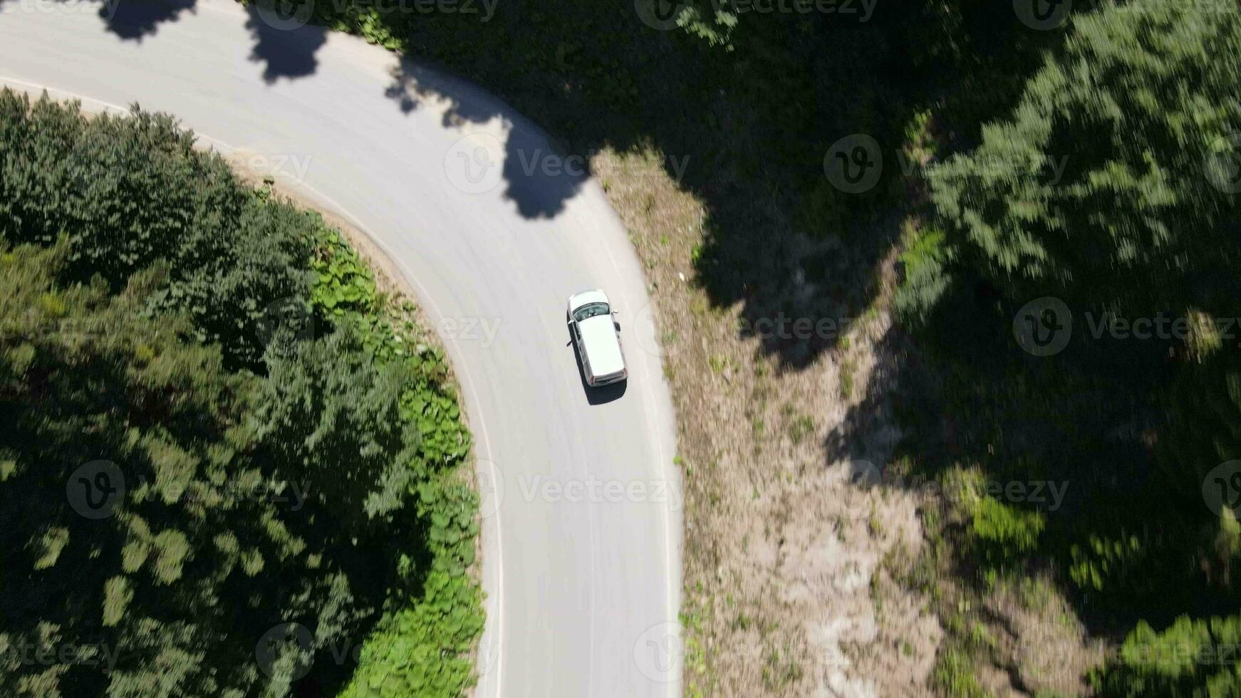 Drone footage of Zigzag Road between Forest photo
