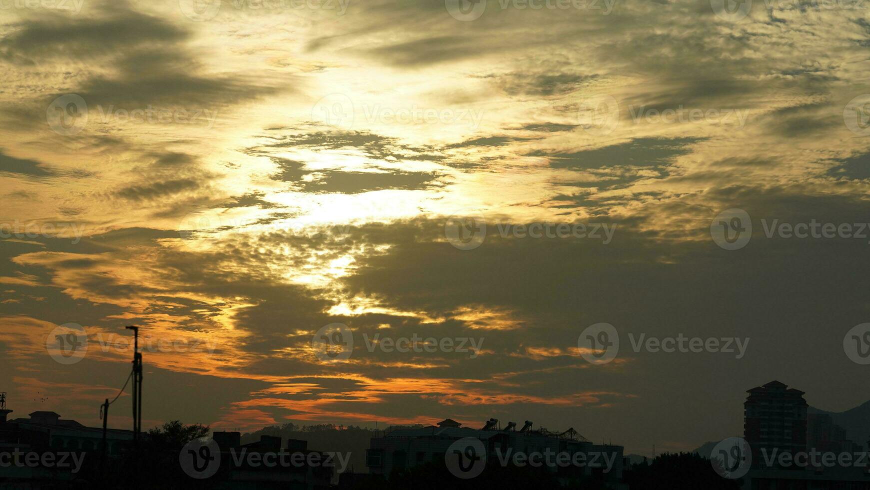 The beautiful sunset view with the colorful clouds as background photo