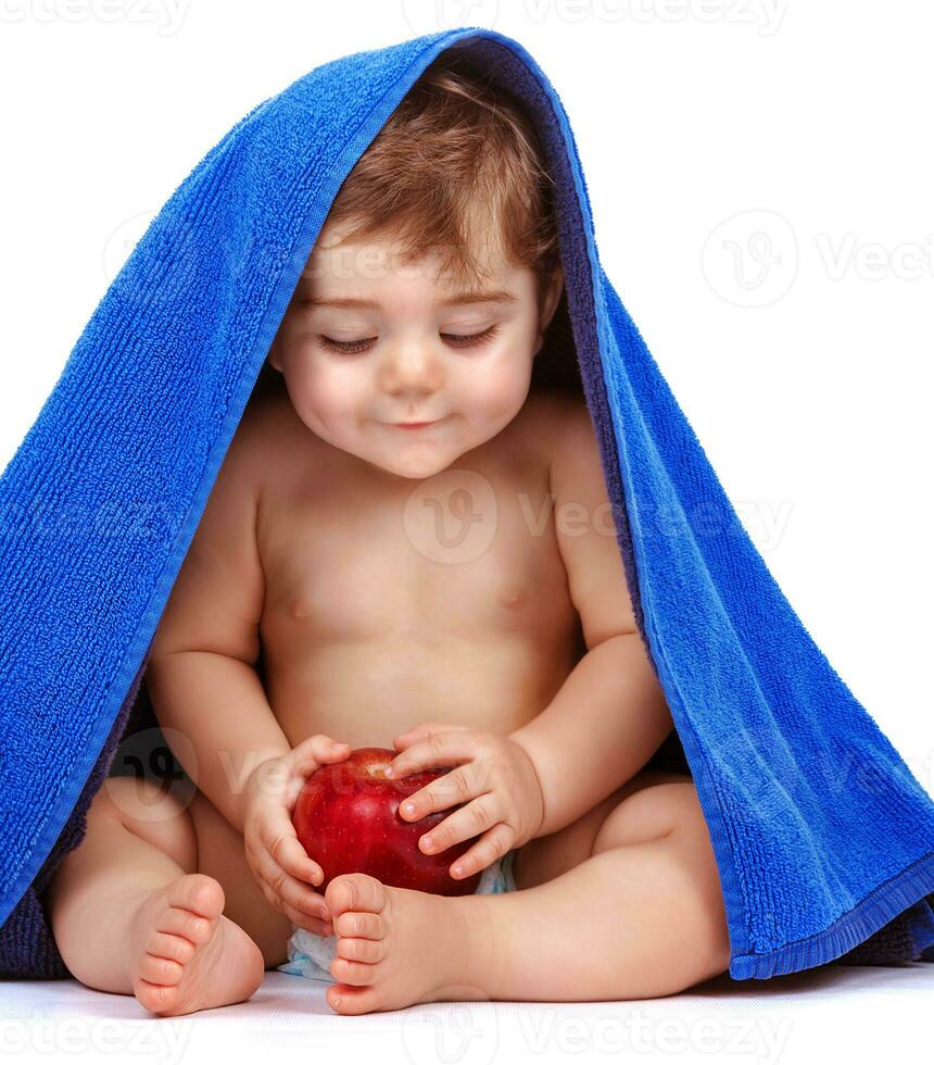 Happy child with fresh fruit photo