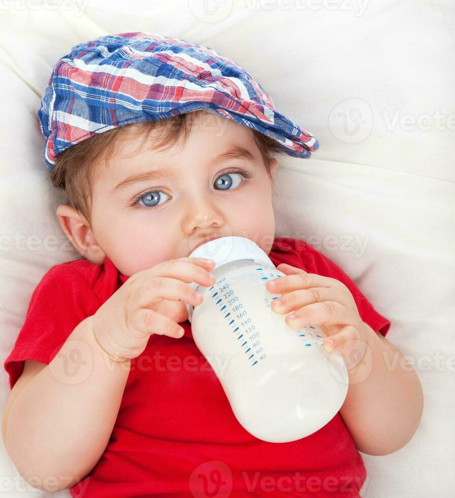 Cute little boy eating photo