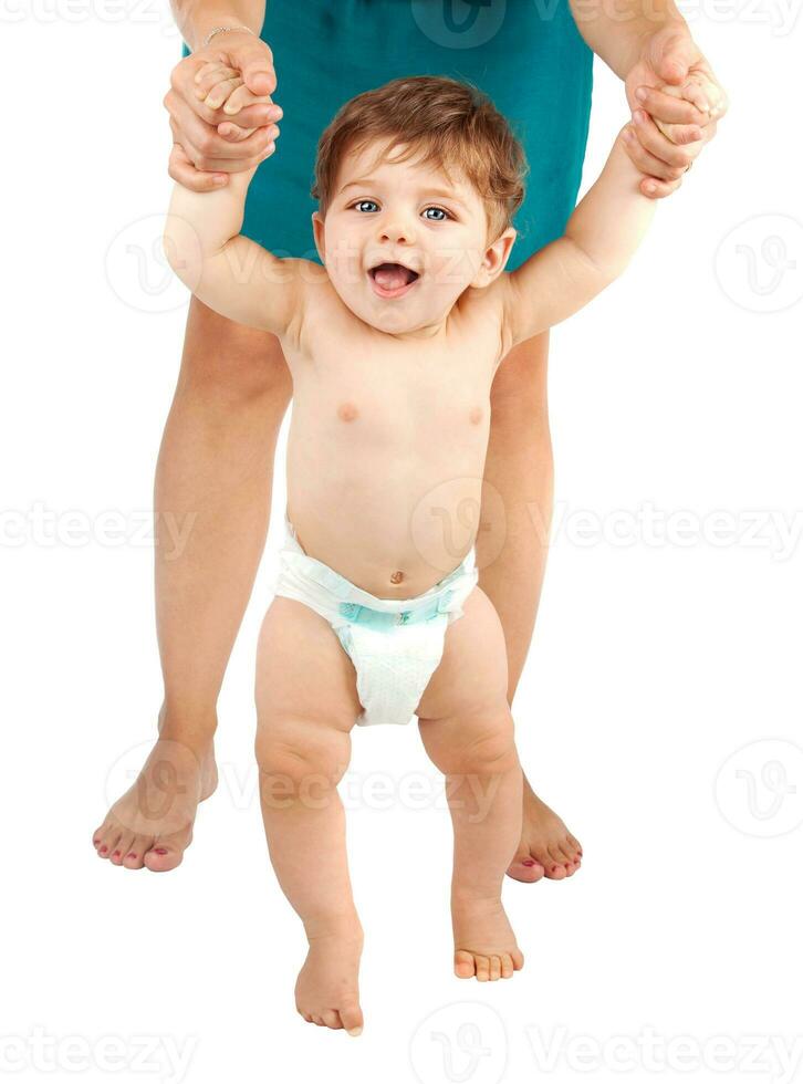 Cute baby boy first steps photo