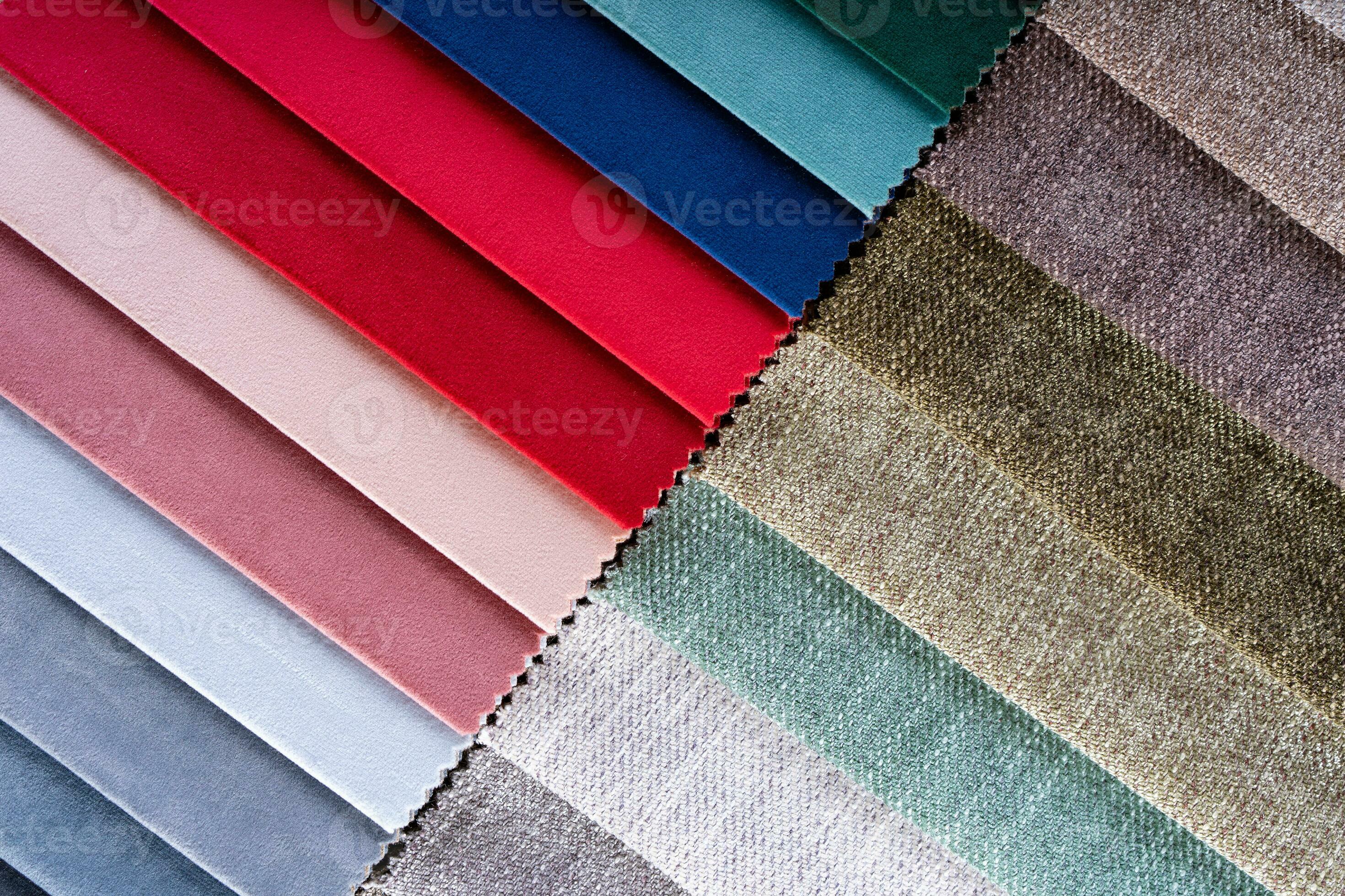 Multi colored set of upholstery fabric samples for selection, collection of textile swatches