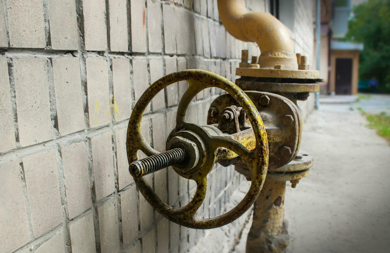 old yellow gas faucet photo
