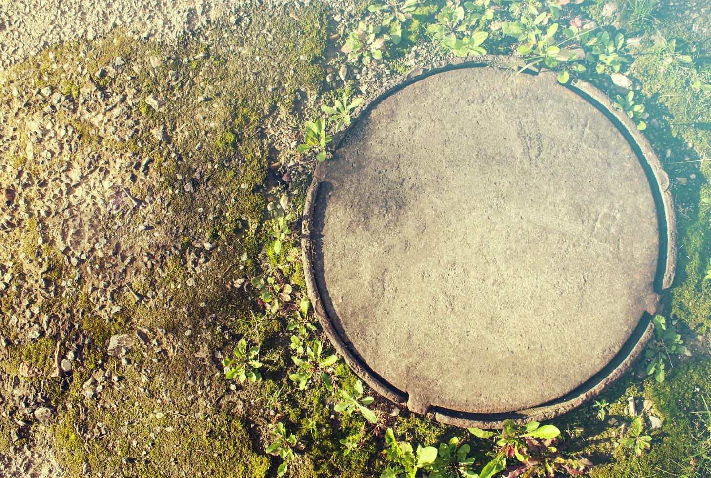 background of the sewer manhole texture photo