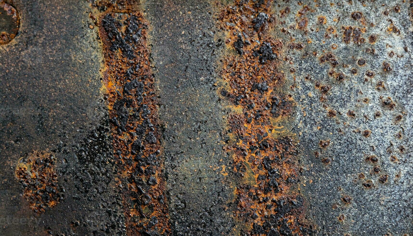 macro foto de oxidado negro superficie de metal plato con metal textura