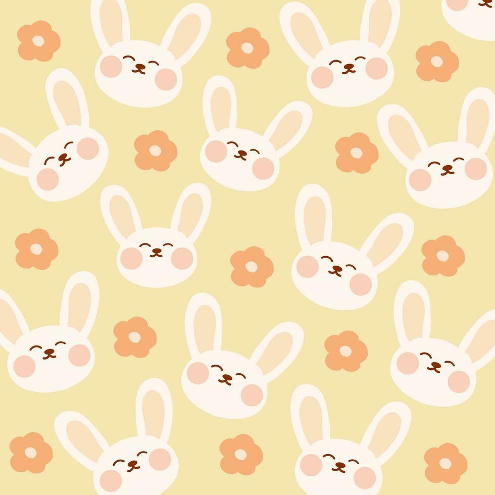 seamless pattern with bunnies and flowers vector