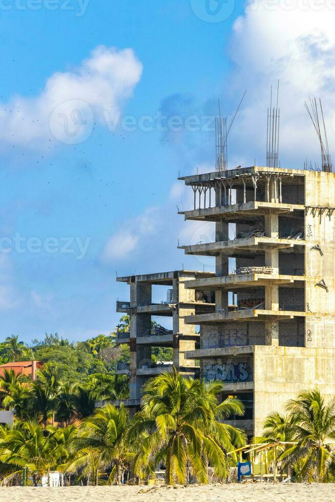 Huge gigantic construction stop building ruin in Puerto Escondido Mexico. photo