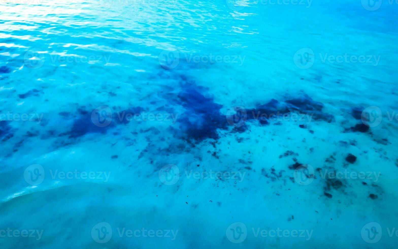 Waves at tropical beach caribbean sea clear turquoise water Mexico. photo