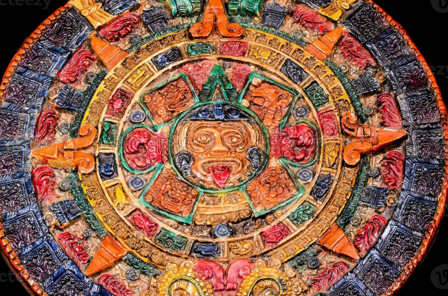 the mayan calendar is a colorful, decorative object photo