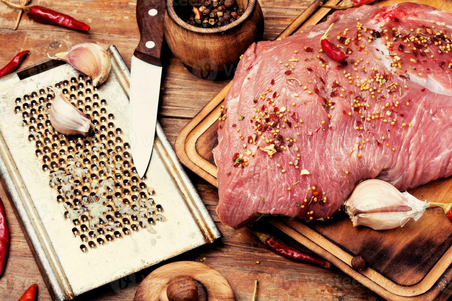 Raw fresh meat on wooden background photo