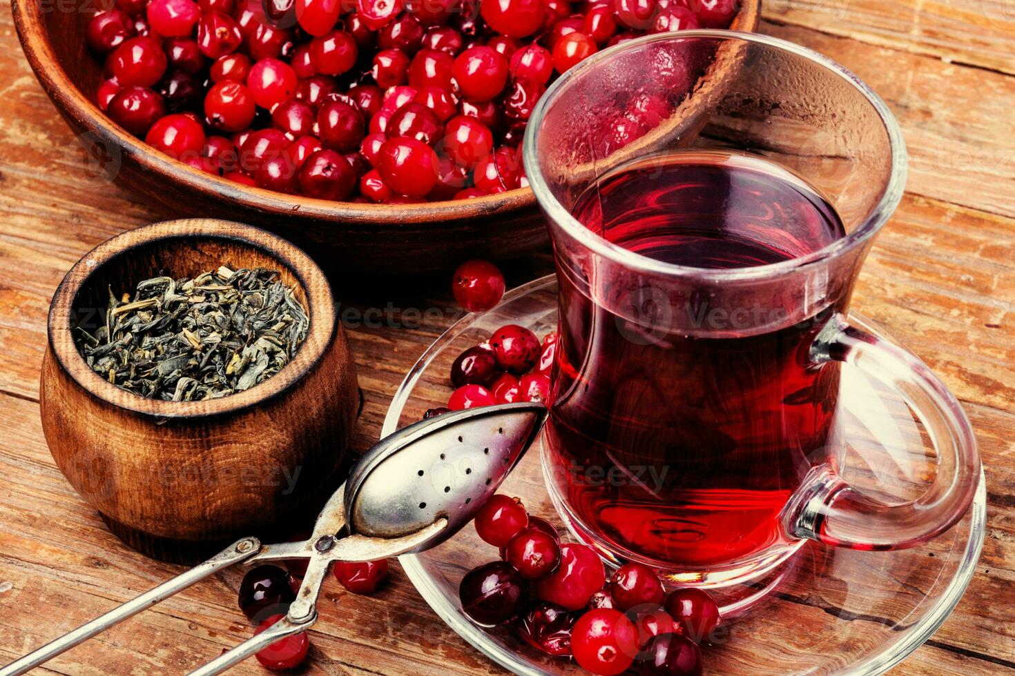 Aromatic hot tea on wooden table photo
