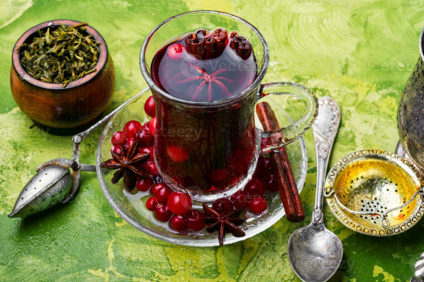 Hot tea with cranberry photo