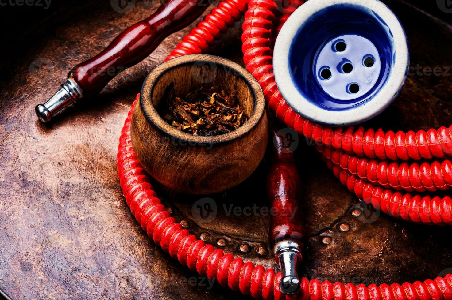 Smoking hookah with tobacco photo