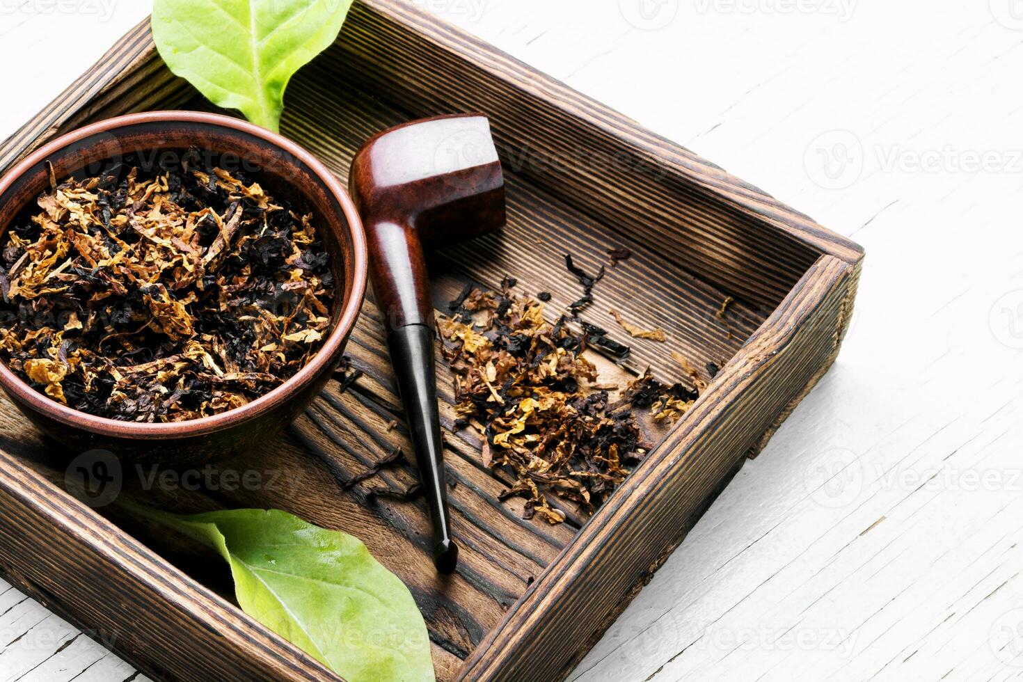 Smoking tobacco pipe photo