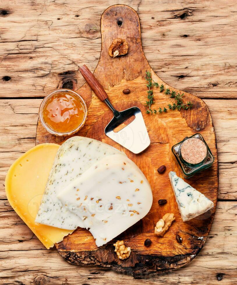 Different kinds of cheeses photo