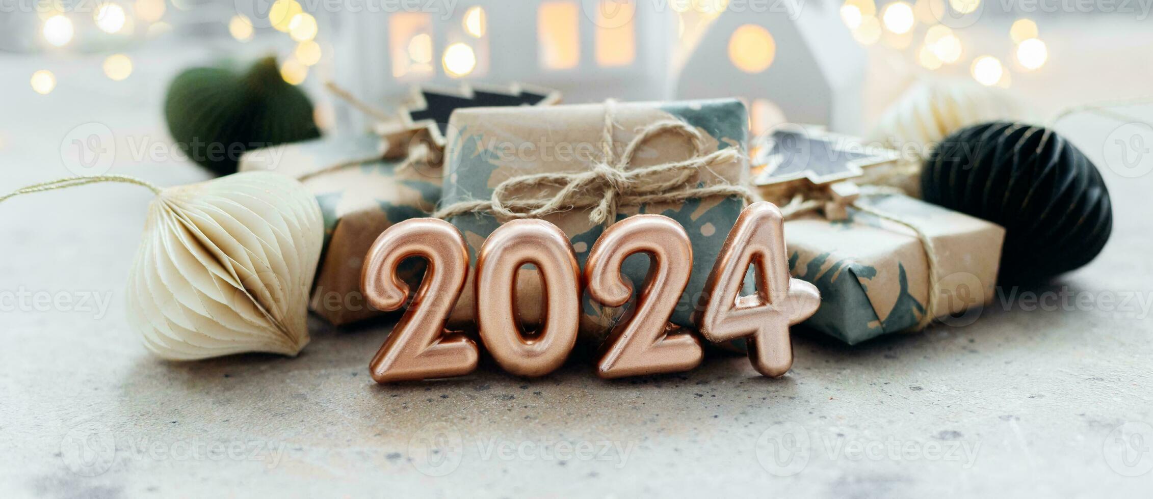 Christmas and New Year card. Number 2024 on holiday background. Christmas lights bokeh background. Holiday postcard. Happy New Year 2024 Card Concept photo