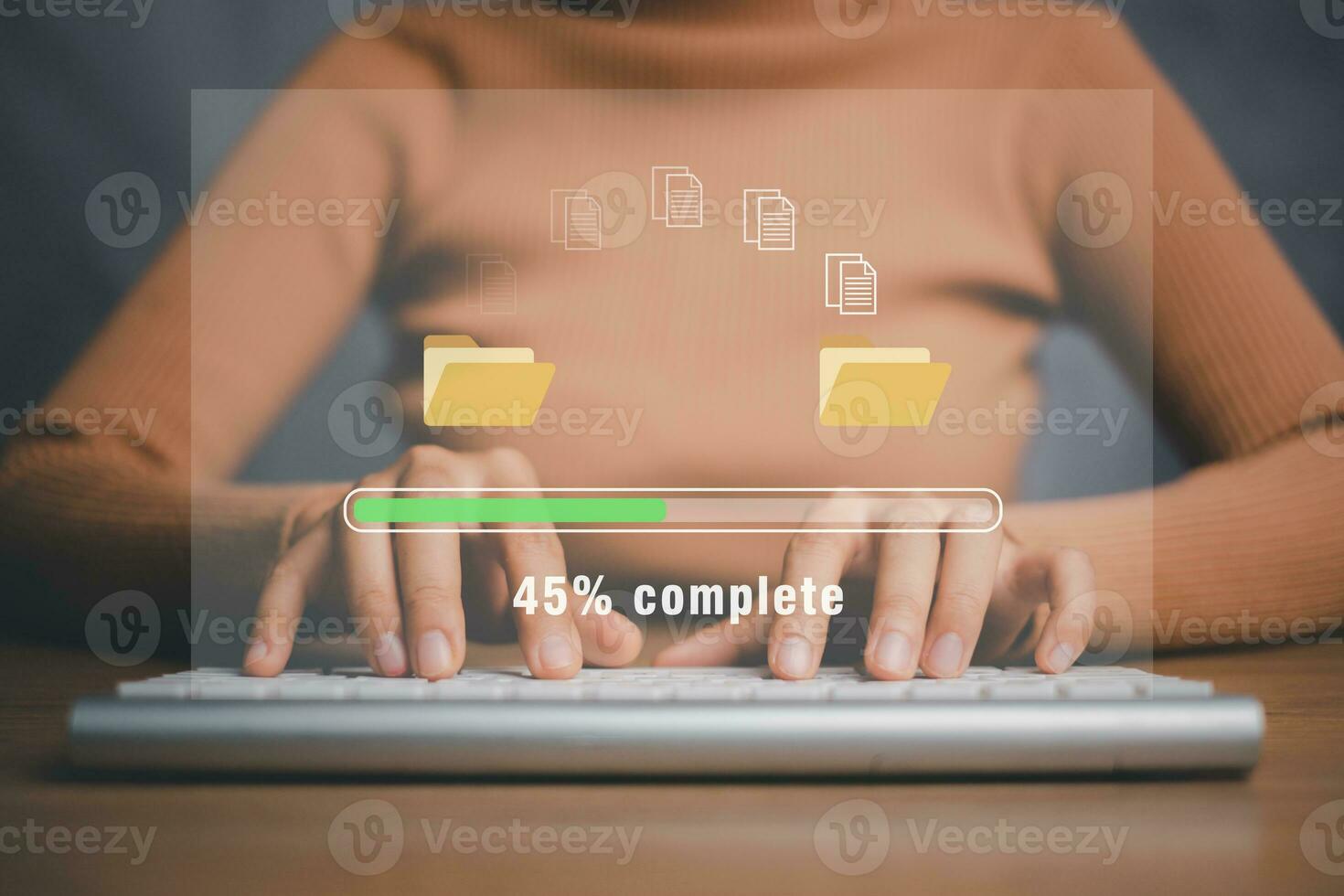 Transfer files data system relocation concept, Person hand using laptop computer waiting for transfer file process with loading bar icon on virtual screen. photo