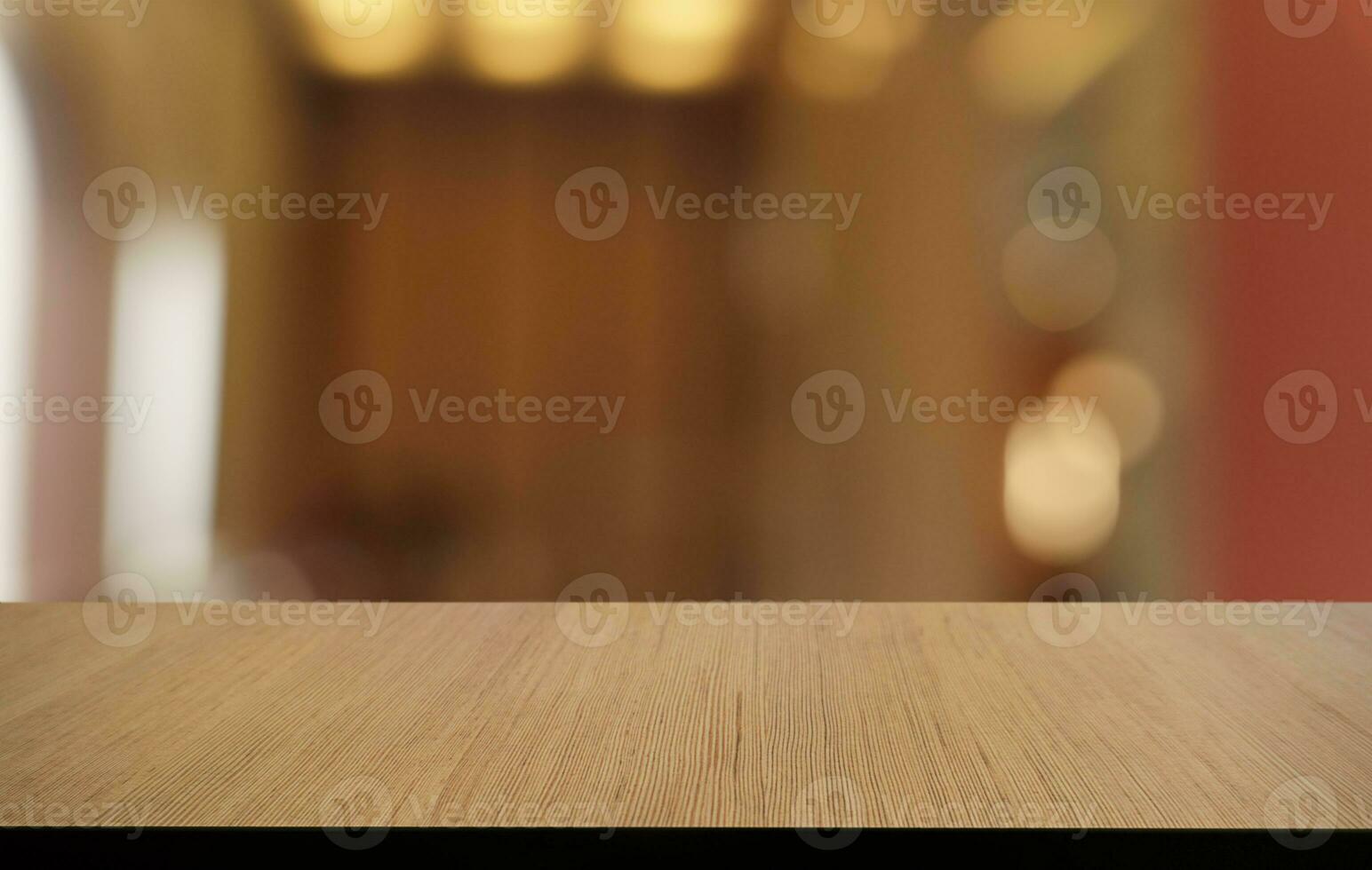 Mock up for space. Empty dark wooden table in front of abstract blurred bokeh background of restaurant . can be used for display or montage your product photo